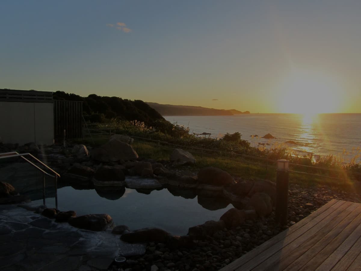 岬の湯しゃこたん露天風呂からの夕日